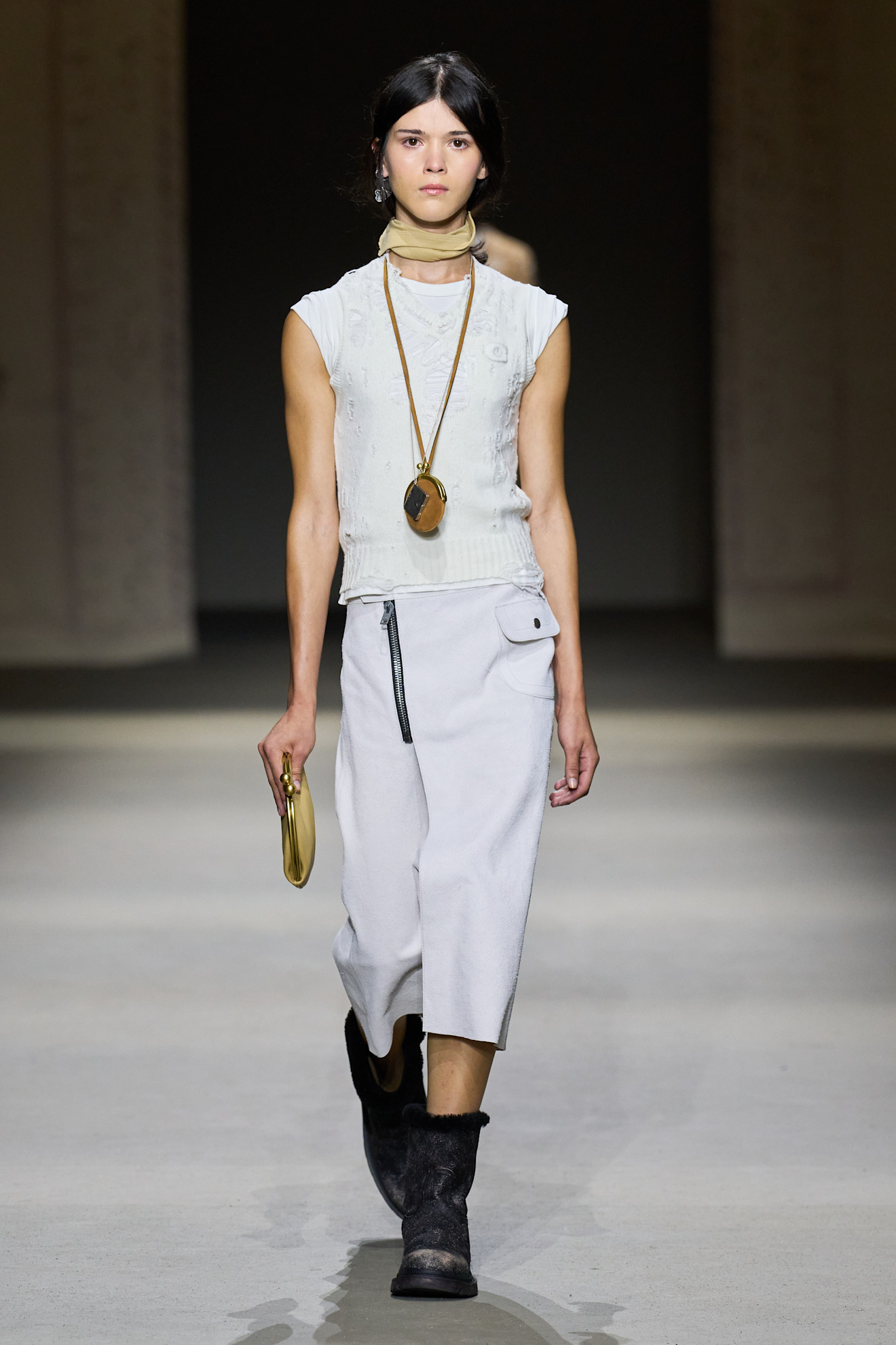 An image of the Coach spring/summer 2026 runway featuring black moto boots.