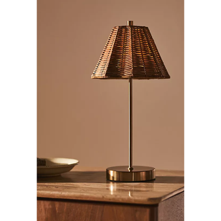 rechargeable table lamp with a rattan shade