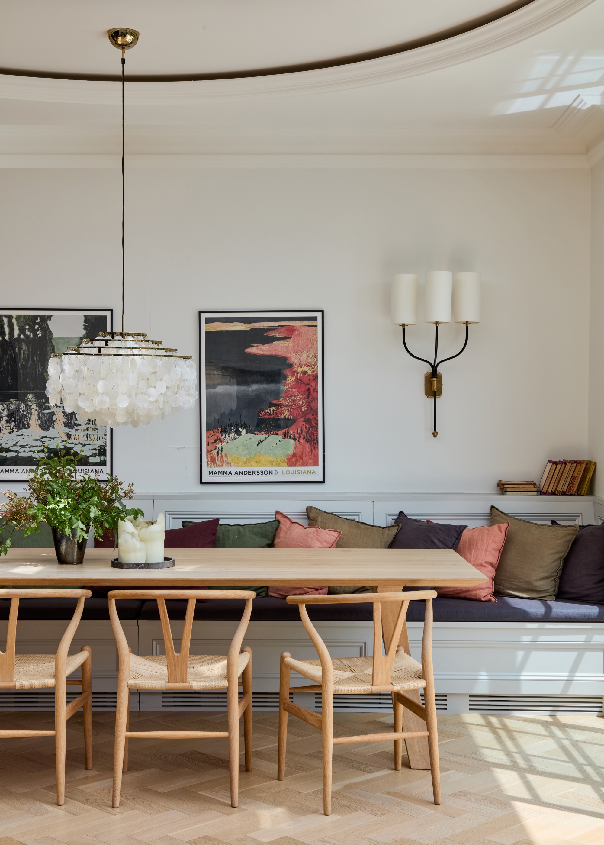 Kitchen dining room with sculptural chandelier over table by Imperfect Interiors