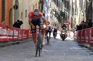 SIENA ITALY MARCH 06 Mathieu Van Der Poel of Netherlands and Team AlpecinFenix Julian Alaphilippe of France and Team Deceuninck QuickStep Egan Arley Bernal Gomez of Colombia and Team INEOS Grenadiers during the Eroica 15th Strade Bianche 2021 Mens Elite a 184km race from Siena to Siena Piazza del Campo Breakaway StradeBianche on March 06 2021 in Siena Italy Photo by Luc ClaessenGetty Images