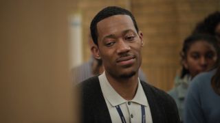 Tyler James Williams as Gregory on Abbott Elementary looking longingly at Janine.