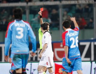 Mark van Bommel is sent off on his Serie A debut for AC Milan against Catania in January 2011.