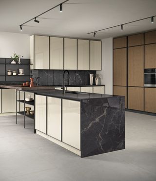 a modern cream kitchen with marble surfaces