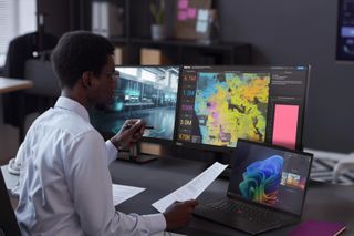 Lifestyle image of the Lenovo ThinkPad P14s Gen 6 mobile workstation open on a desk.