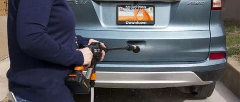 The Worx Hydroshot WG629 being used to wash a car