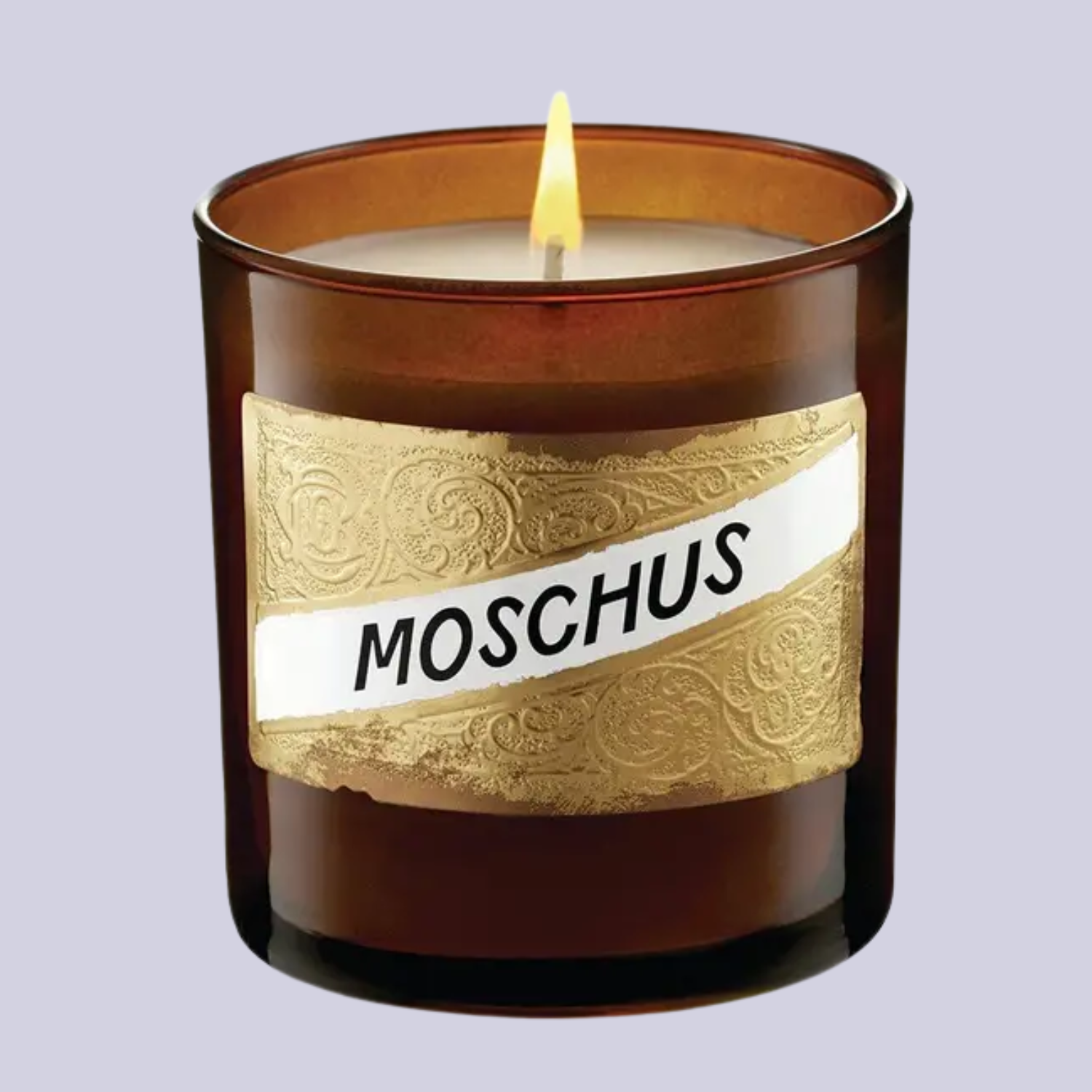 A scented candle in an amber glass vessel