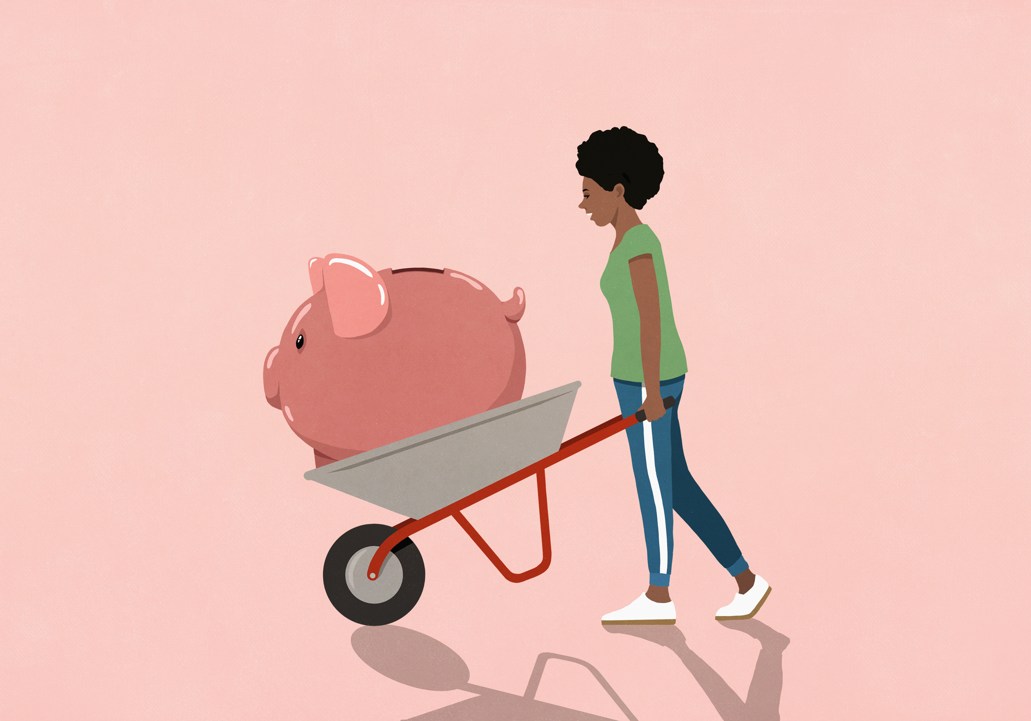 a person hoisting a piggy bank in a wheelbarrow