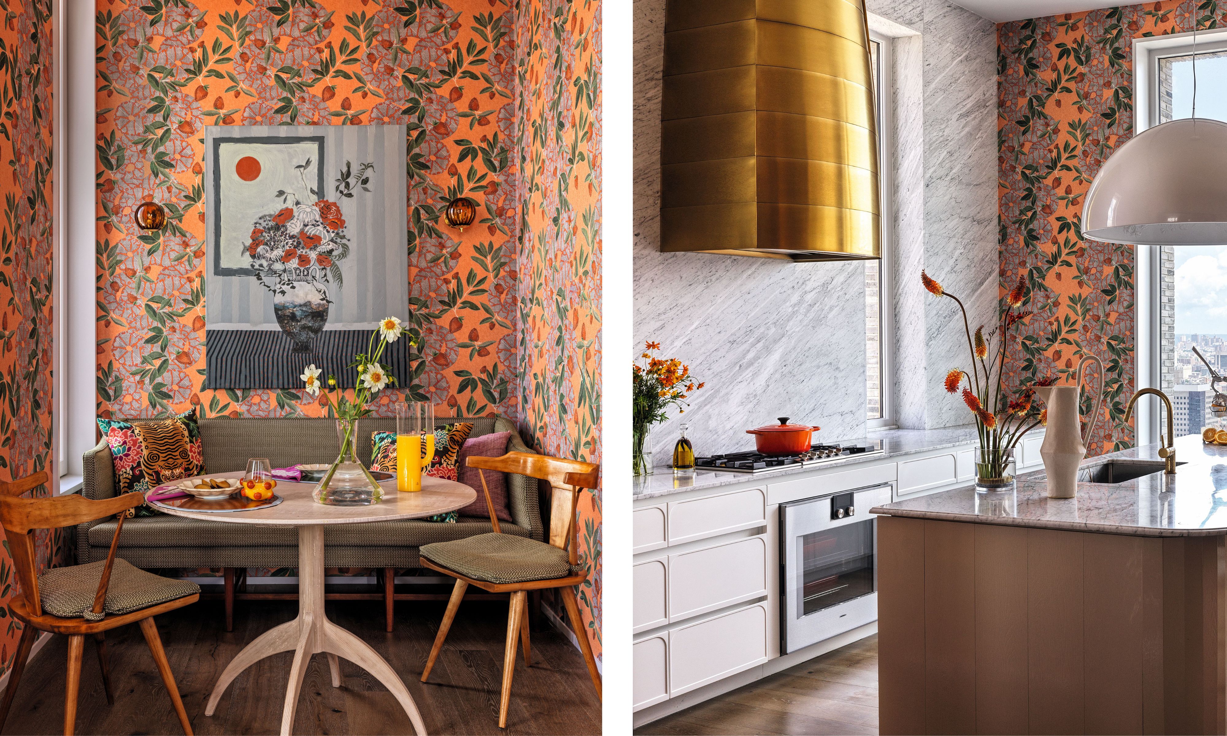 Two images of the same kitchen. The left image is of the dining nook which is covered in an orange floral wallpaper and have a gray banquette bench and circular dining table. The other image is of the kitchen with the same wallpaper and a wall of marble. The cabinets are white and the range hood is gold