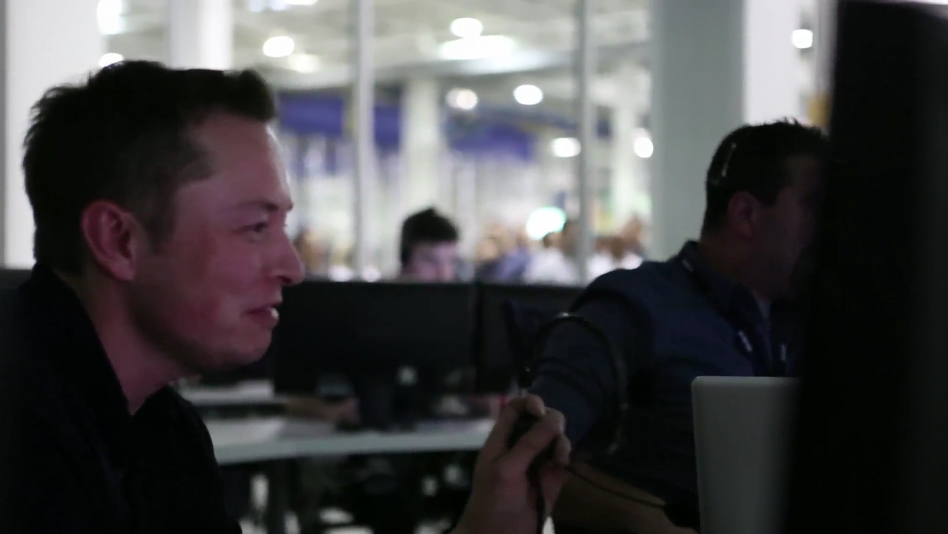 SpaceX CEO Elon Musk smiles after the successful launch of SpaceX's first Falcon 9 rocket and Dragon capsule launch to the International Space Station on May 22, 2012. Musk watched the Florida launch from SpaceX's mission control in California.