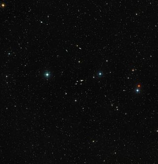 A ground-based look at the region around the band of seven strange galaxies, HCG 16, taken by Digitized Sky Survey 2.