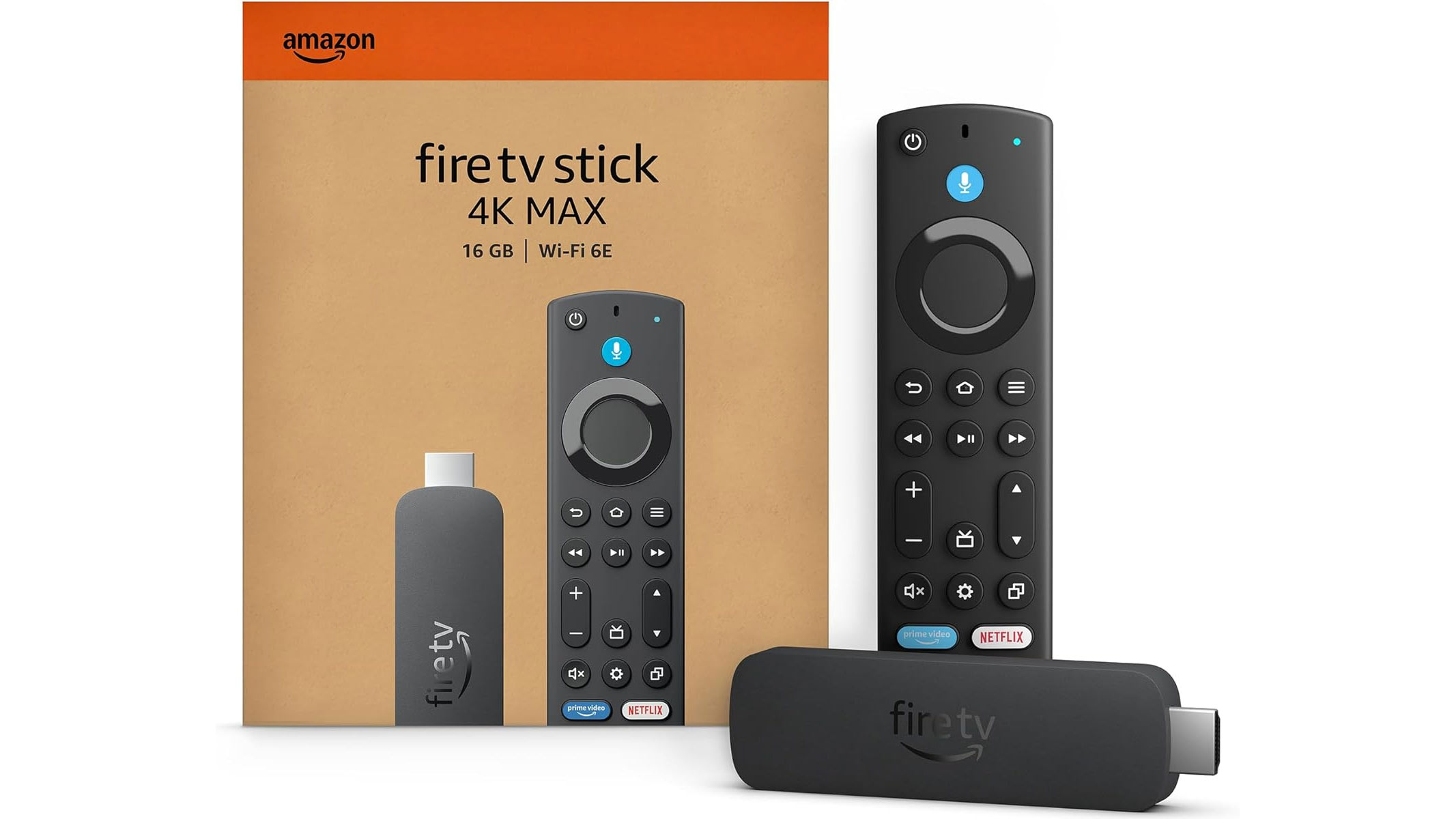 A Black stick with a silver HDMI port sticking out the end of it is laid down infront of a black remote controller, both next to a beige product box and on an orange background.
