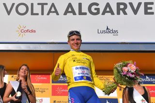 ALTO DO MALHO LOUL PORTUGAL FEBRUARY 22 Podium Remco Evenepoel of Belgium and Team Deceuninck Quick Step Yellow Leader Jersey Celebration Miss Hostess during the 46th Volta ao Algarve 2020 Stage 4 a 1697km stage from Albufeira to Alto do Malho 518m Loul VAlgarve2020 on February 22 2020 in Alto do Malho Loul Portugal Photo by Tim de WaeleGetty Images