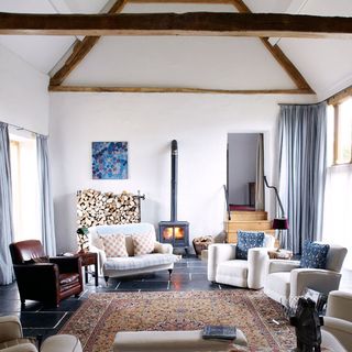 white living room with armchairs
