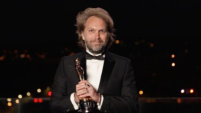 Florian Zeller accepts the 2021 Oscar for Adapted Screenplay for 'The Father'