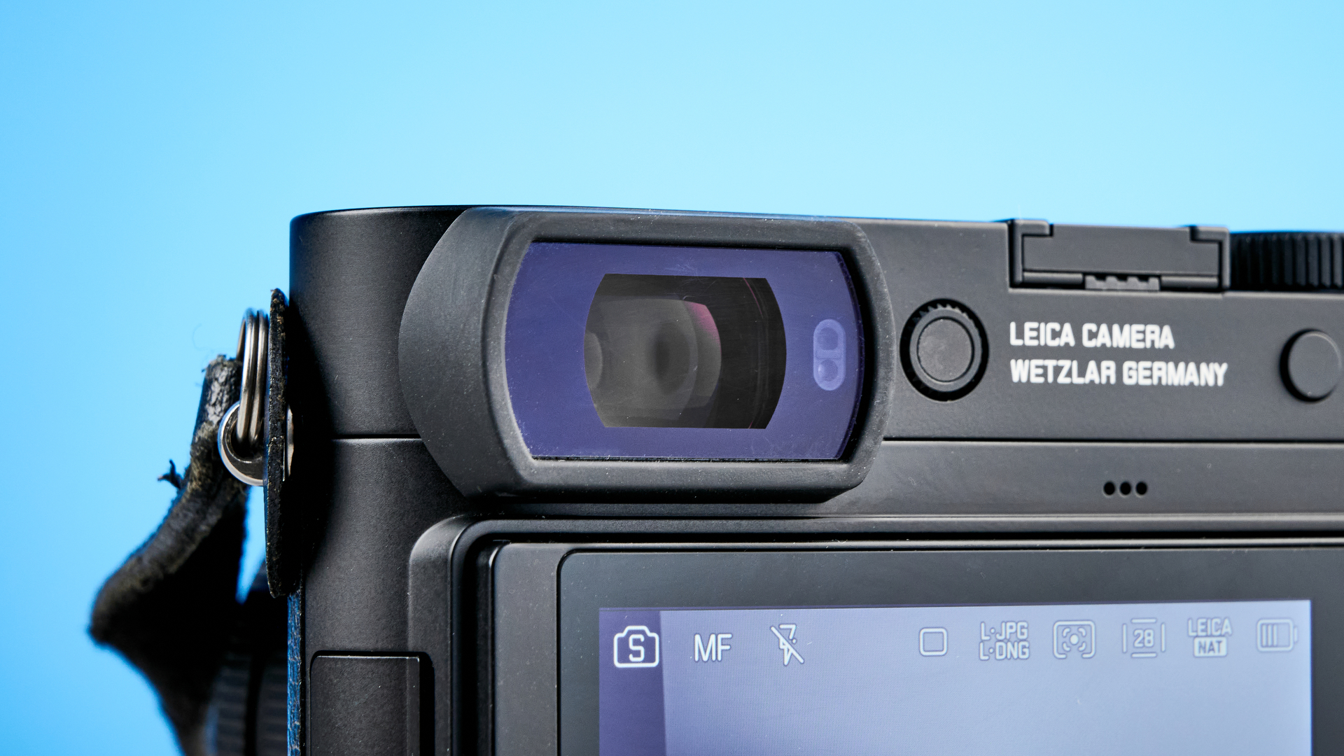 A black Leica Q3 Monochrom black-and-white mirrorless camera