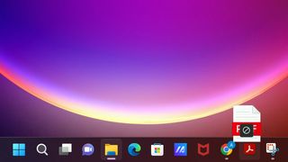 Windows 11 2022 update showing off drag and drop taskbar functionality