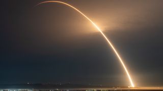 a rocket launches at night