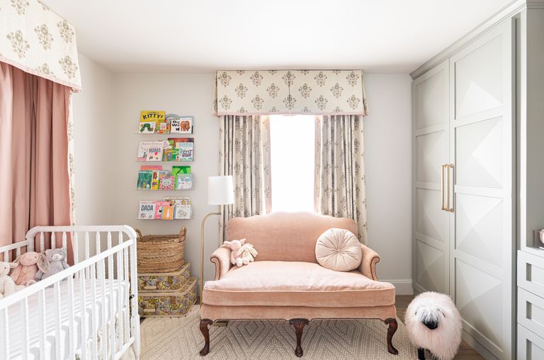 baby girl nursery with custom drapery and valance, bespoke cabinetry, heirloom pieces 