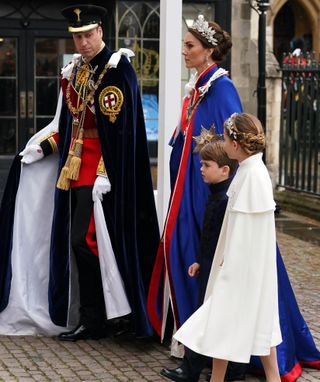 Prince William, Kate Middleton, Princess Charlotte, and Prince Louis arriving at Westminster Abbey for the Coronation