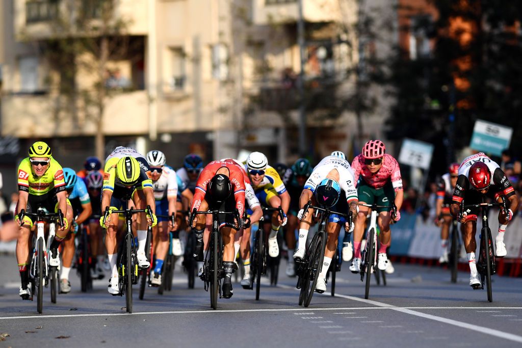 ROQUETAS DE MAR SPAIN FEBRUARY 13 Alexander Kristoff of Norway and Team Intermarch Wanty Gobert Matriaux Nacer Bouhanni of France and Team Arkea Samsic Giacomo Nizzolo of Italy and Team Israel Premier Tech Aniolkowski Stanislaw of Poland and Team Bingoal Pauwels Sauces WB Juan Sebastian Molano Benavides of Colombia and UAE Team Emirates Simone Consonni of Italy and Team Cofidis and Marijn Van Den Berg of Netherlands and Team EF Education Easypost sprint to win during the 35th Clsica de Almera 2022 a 1882km one day race from El Ejido to Roquetas de Mar ClsicaAlmera22 on February 13 2022 in Roquetas de Mar Spain Photo by Tim de WaeleGetty Images