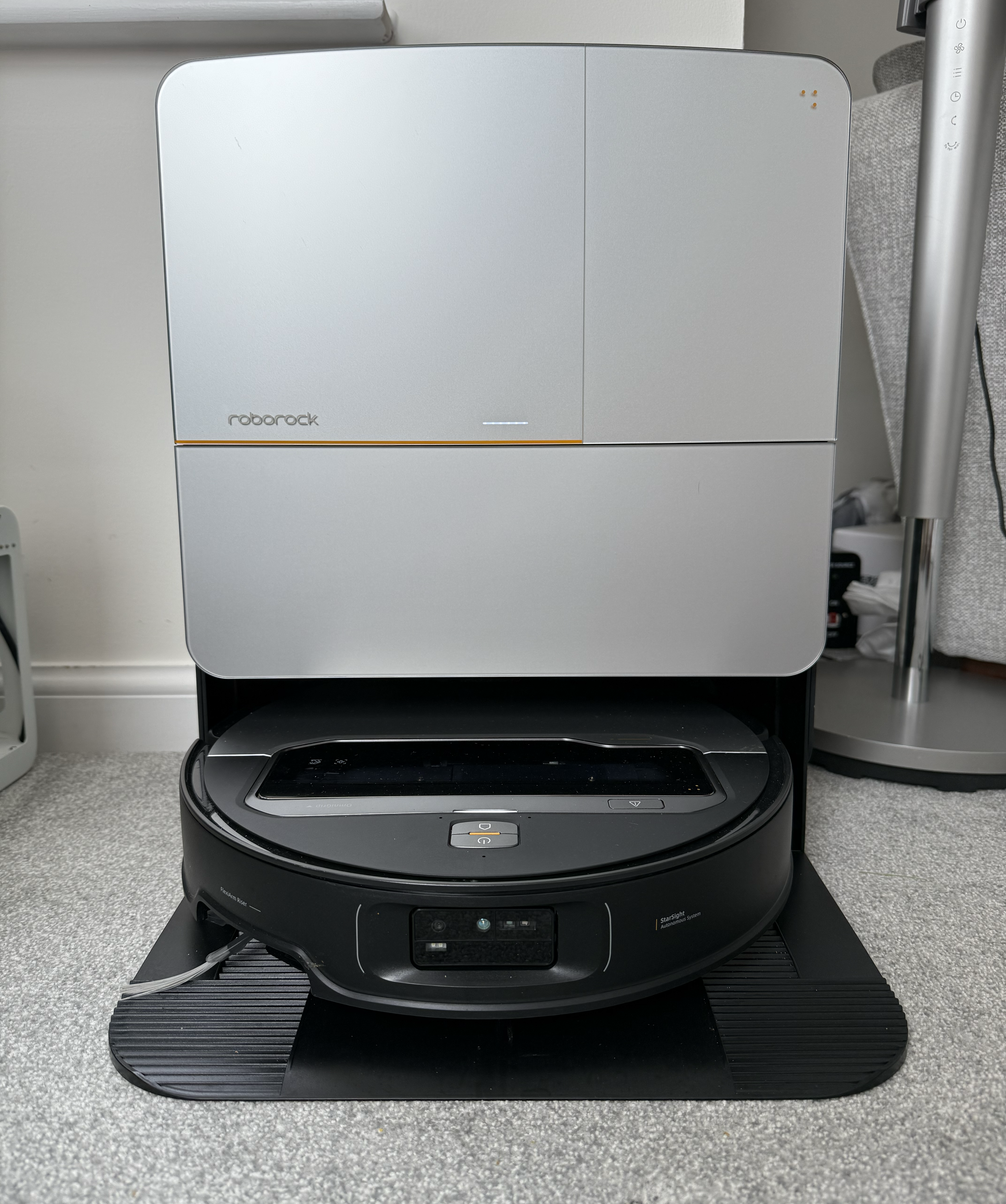 Roborock Saros Z70 docked in cleaning station in Victoria Woollaston's home