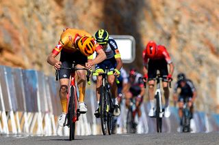 QURAYYAT OMAN FEBRUARY 12 LR Anthon Charmig of Denmark and UNO X Pro Cycling Team sprints to win ahead of Jan Hirt of Czech Republic and Team Intermarch Wanty Gobert Matriaux and Elie Gesbert of France and Team Arka Samsic during the 11th Tour Of Oman 2022 Stage 3 a 180km stage from Sultan Qaboos University to Qurayyat 240m TourofOman on February 12 2022 in Qurayyat Oman Photo by Dario BelingheriGetty Images