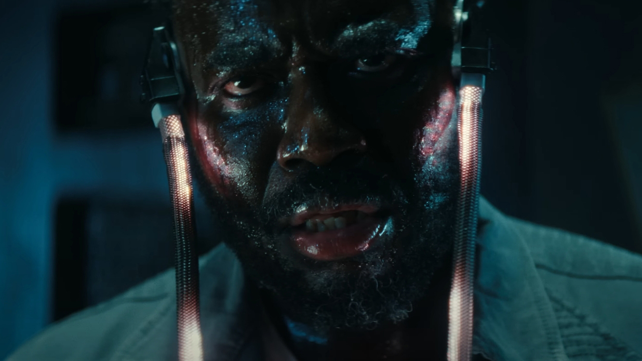Screenshots from Alien Earth showing a man with wires attached to his temples, sweating and looking nervous.