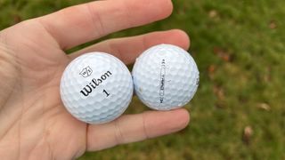 Wilson Triad golf ball in hand