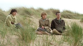 Keira Knightley as Ruth C, Carey Mulligan as Kathy H, and Andrew Garfield as Tommy D in Never Let Me Go