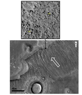 A black and white aerial view of Mars surface features craters, smooth areas, and various geological features. An arrow points to a point, magnified in an image above, which shows rocky terrain.