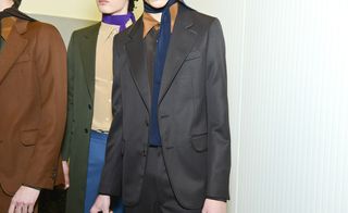 Torso shot of two models in prada jackets
