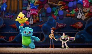 Toy Story 3 Ducky and Bunny look back at Woody and Buzz