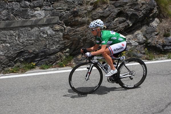 Emma Pooley (Cervelo Test Team) in the mountains competition jersey accelerated away from the group on the climb.