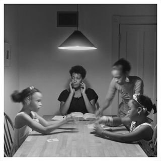 Carrie Mae Weems photo of family at kitchen table