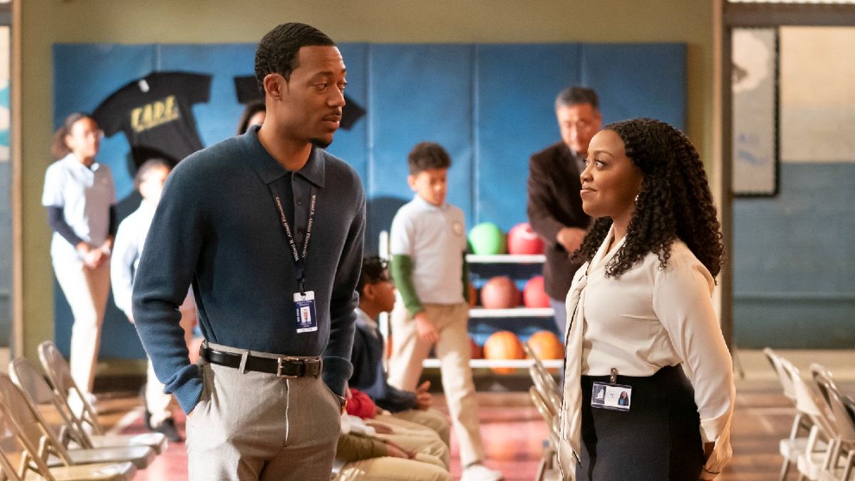 Gregory and Janine looking at each other on Abbott Elementary.