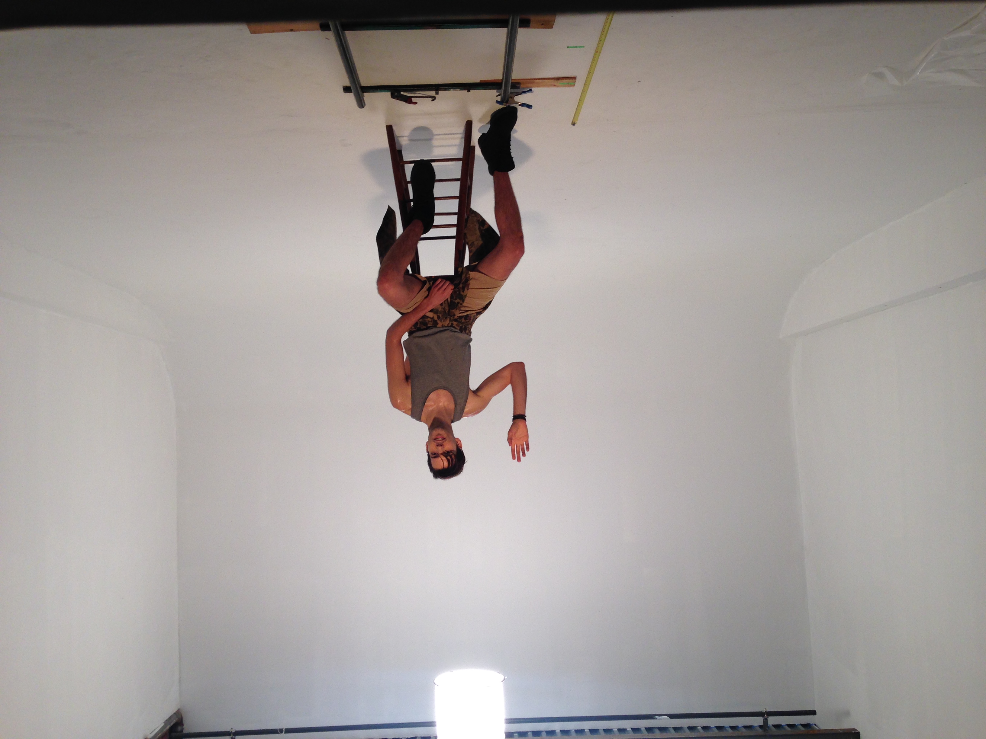 behind the scenes photo from the set of the your best american girl music video featuring actor tyler sitting on a stool