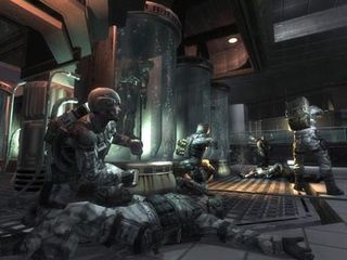Medic! GDF soldiers do battle inside the Strogg stronghold in another E3 screenshot.
