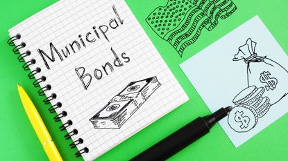"Municipal bonds" is written in a notebook, with drawn pictures of cash and coins on a bright green background.