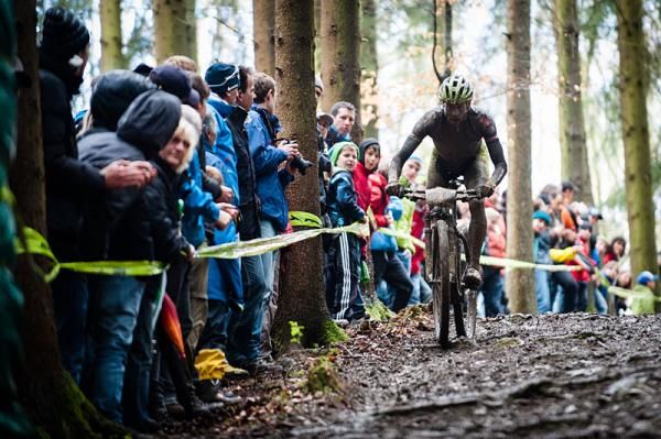 Rudi van Houts (Multivan Merida) is cheered on by spectators on the downhill