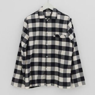 flat lay of black and white large gingham print flannel pajama shirt from tekla