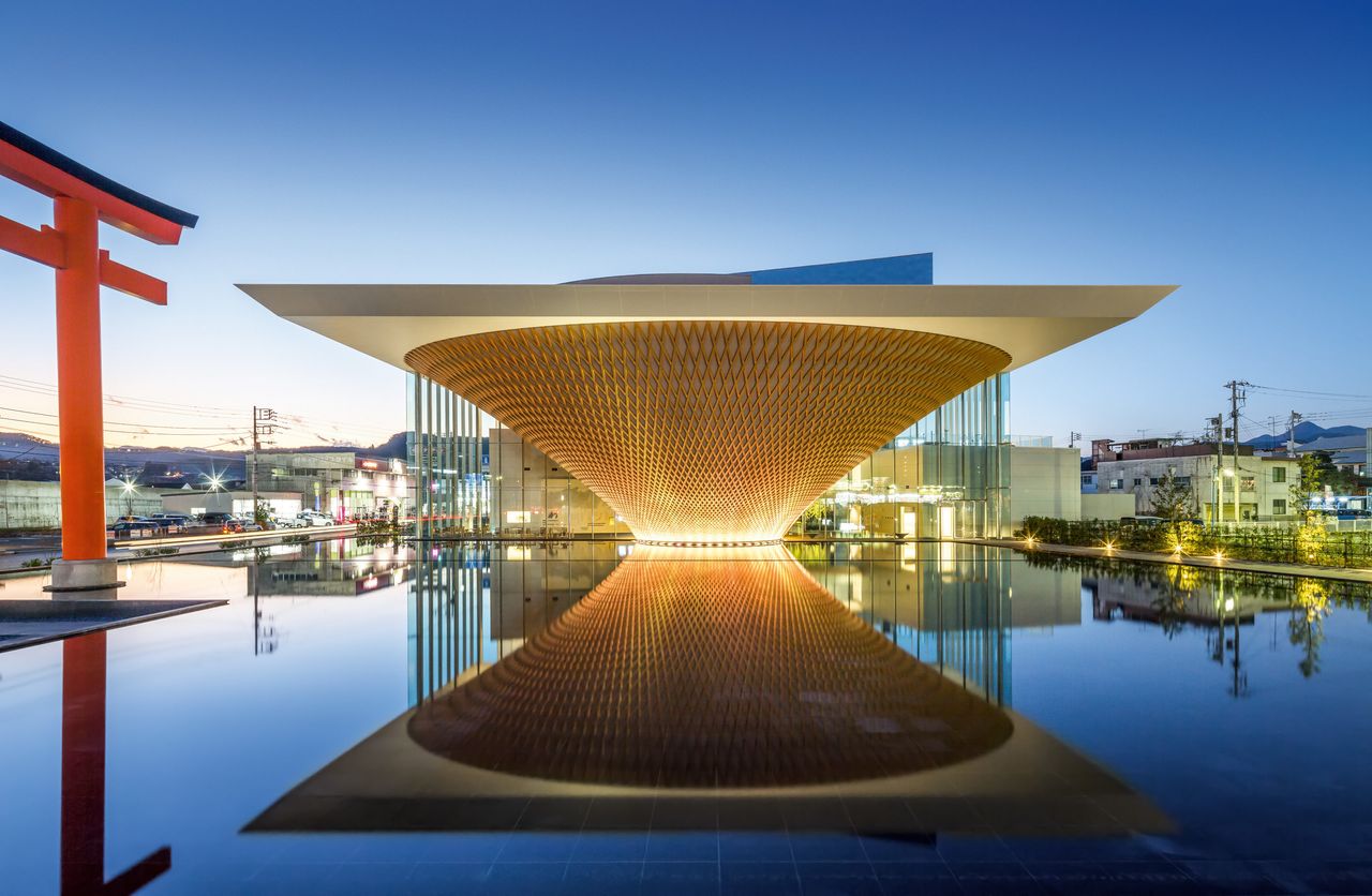 building reflected in water