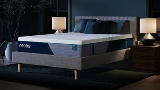 The Nectar Premier Hybrid Mattress on a bed frame in a bedroom