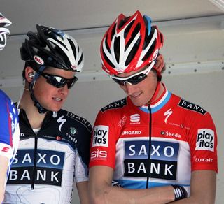 Saxo Bank teammates Jakob Fuglsang and Andy Schleck sign in.