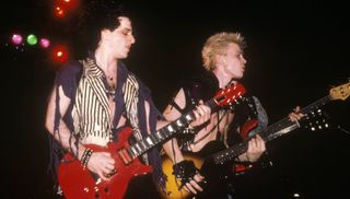 Steve Stevens (left) and Billy Idol perform onstage