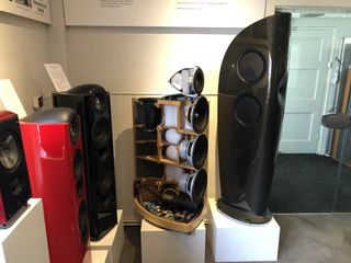 The Concept Blade in all its carbon fibre glory next to the last generation of KEF Reference speakers