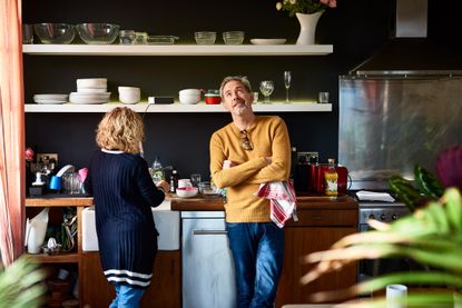 A couple in a high-end kitchen