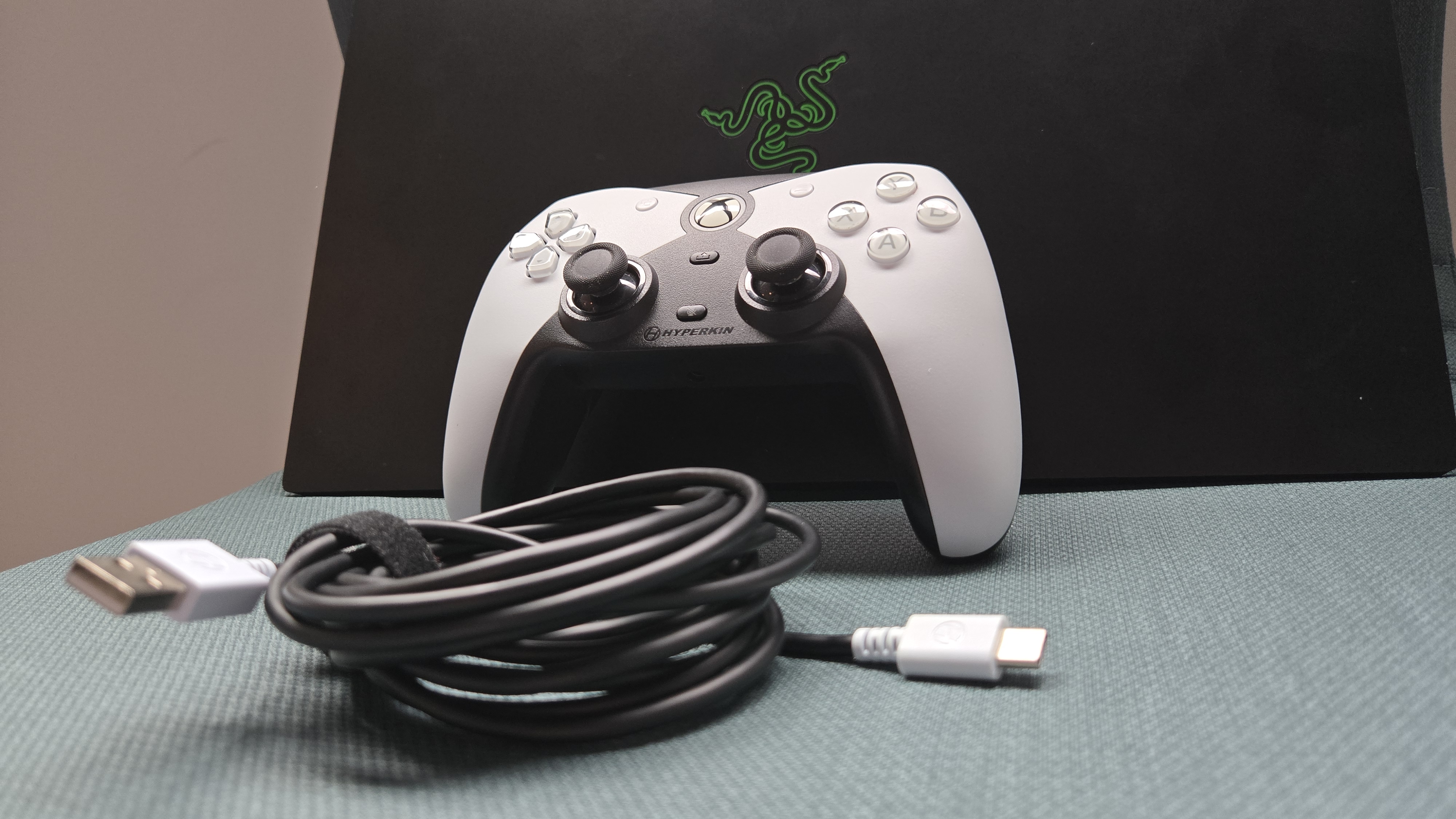 The Hyperkin Competitor on a gaming laptop.