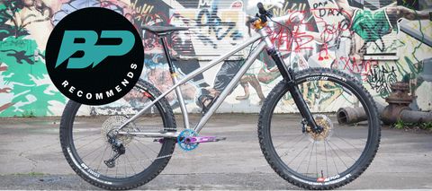 The Starling Roost hardtail MTB by a graffitied wall