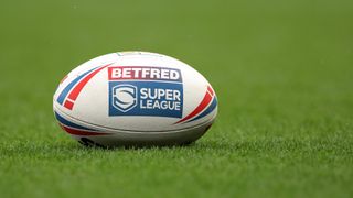 Betfred sponsored rugby ball on the pitch at the Super League Grand Final