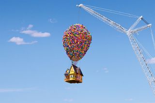 The Up Airbnb being lifted into the air